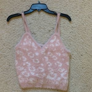 A fuzzy chetah print tank top